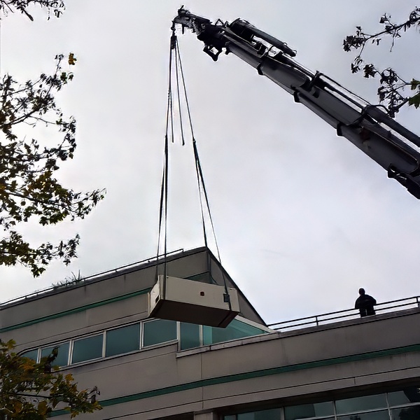 Lorry loader crane lifting and positioning equipment as part of a UK lift and shift service