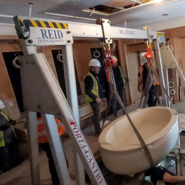 internal lift and shift of a solid marble bath