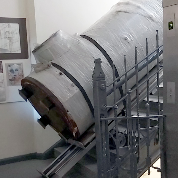 Specialist lifting equipment being used in a restricted access plant room