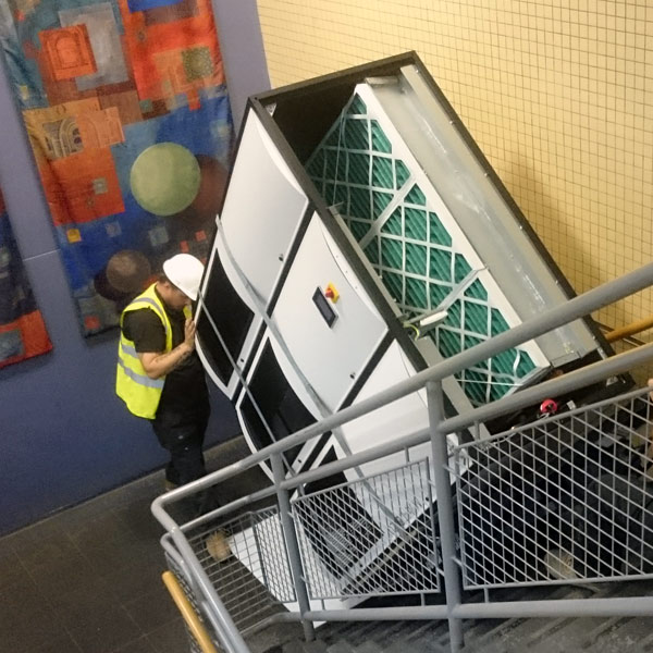 Powered stairclimbing air conditioning unit in a data center