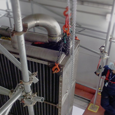 3200kg plate heat exchanger being manoeuvred through Arla Westbury factory using machine skates